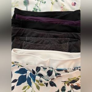 Seven pairs of like-new women’s leggings. Most have pockets. All stain/pill-free